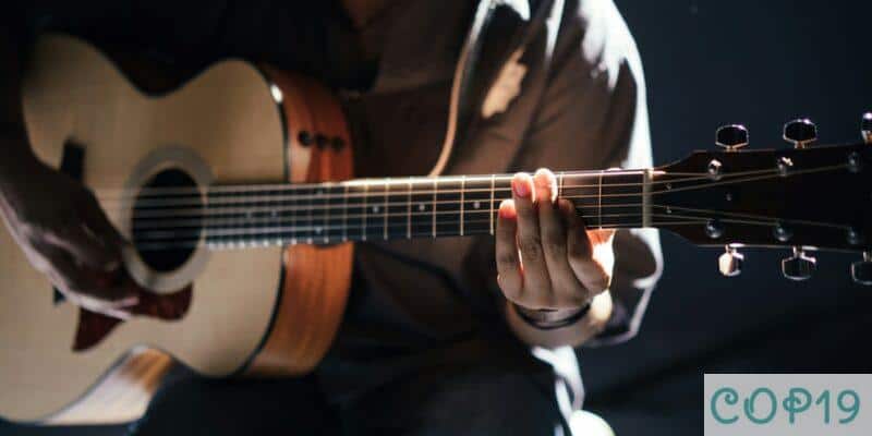 person playing guitar